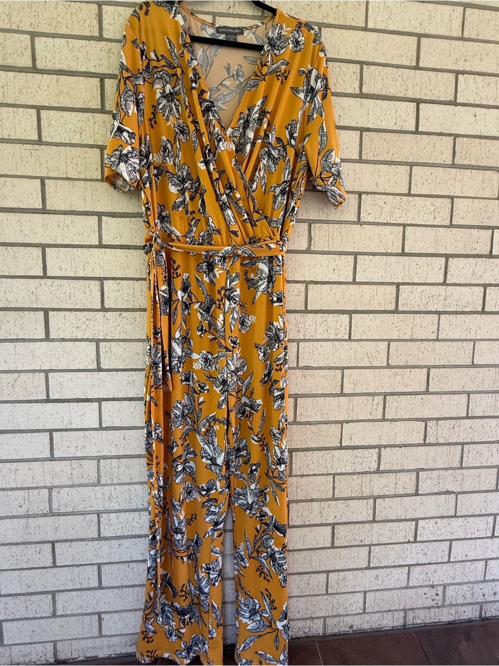 Kate & Mallory Mustard Floral Faux Wrap Jumpsuit